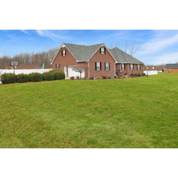 398 Strawberry Ridge Manchester, TN 37355 - Photo 2 of 30 a view of a house with a yard
