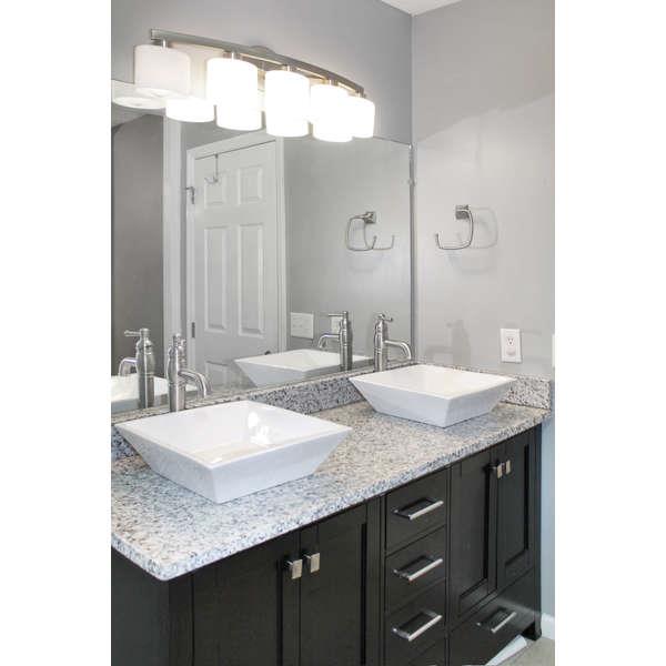 398 Strawberry Ridge Manchester, TN 37355 - Photo 13 of 30 a bathroom with a granite countertop sink and a mirror