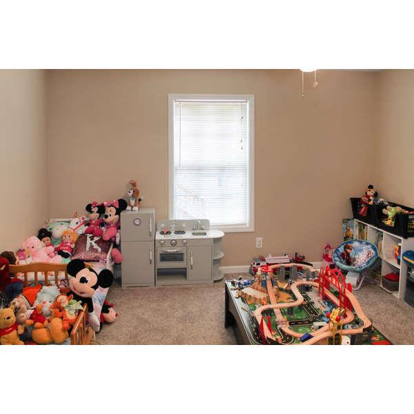 398 Strawberry Ridge Manchester, TN 37355 - Photo 16 of 30 a room with toys and wooden floor
