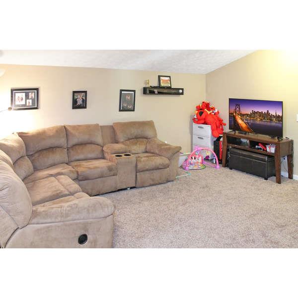 398 Strawberry Ridge Manchester, TN 37355 - Photo 22 of 30 a living room with furniture and a flat screen tv