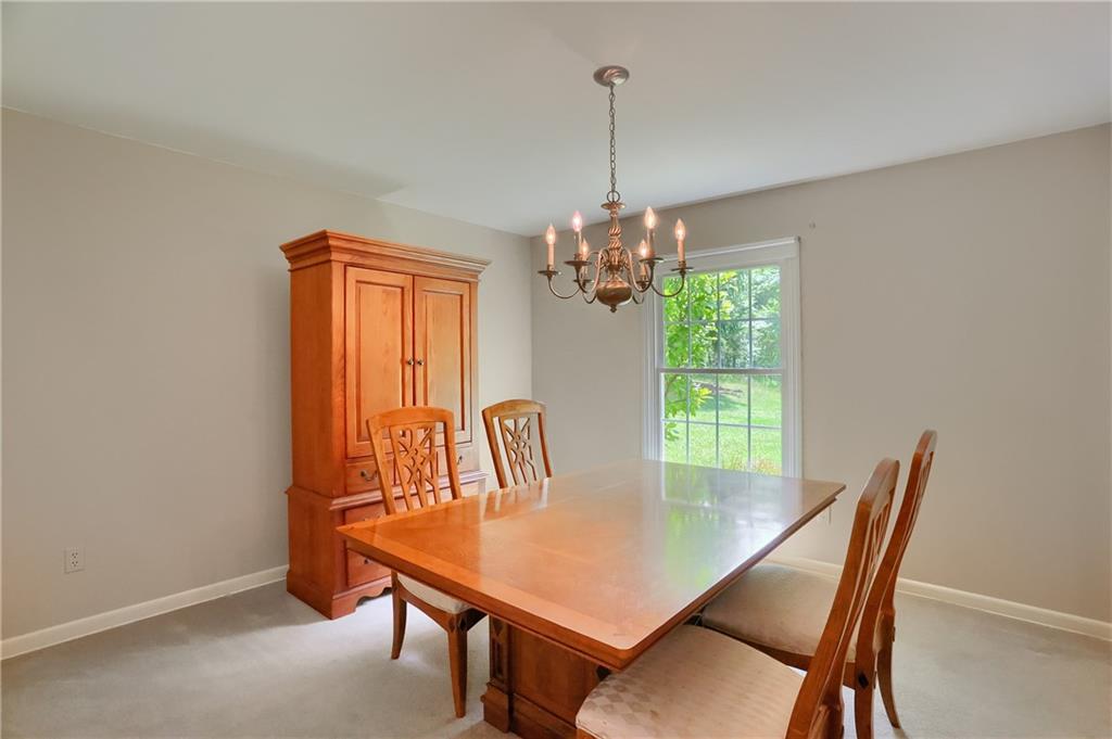 9650 Goehring Road Cranberry Township, PA 16066 - Photo 11 of 48 a view of a dining room with furniture window and outside view