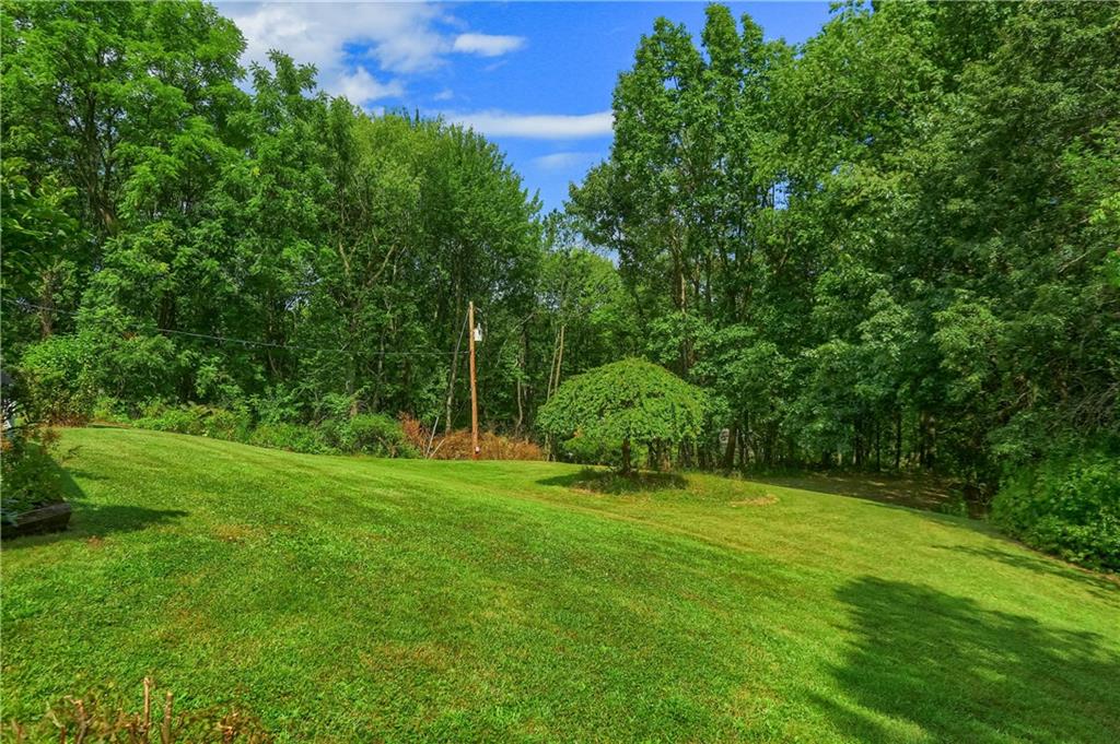 9650 Goehring Road Cranberry Township, PA 16066 - Photo 40 of 48 a view of a grassy field with an trees