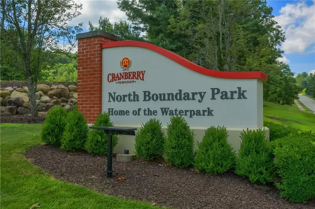 a sign on the side of the road