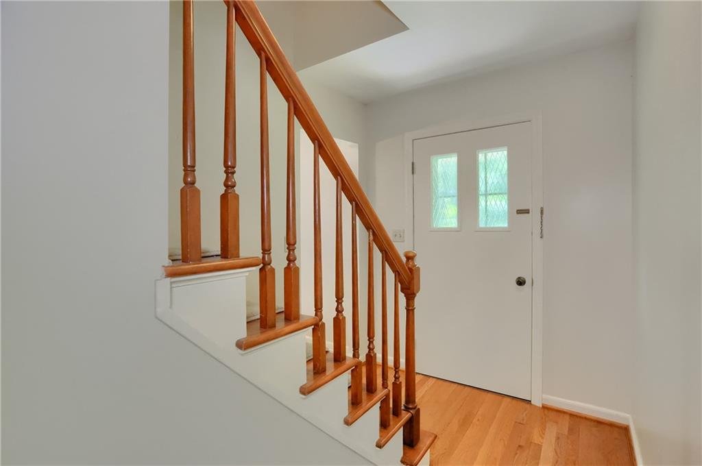 9650 Goehring Road Cranberry Township, PA 16066 - Photo 7 of 48 The bright and airy foyer of the home features hardwood flooring.