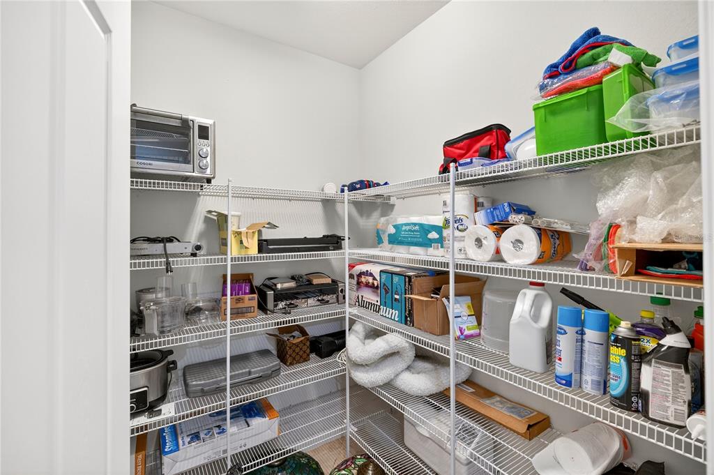 7527 Southwest 97th Terrace Road Ocala, FL 34481 - Photo 40 of 85 a store room with storage and utility