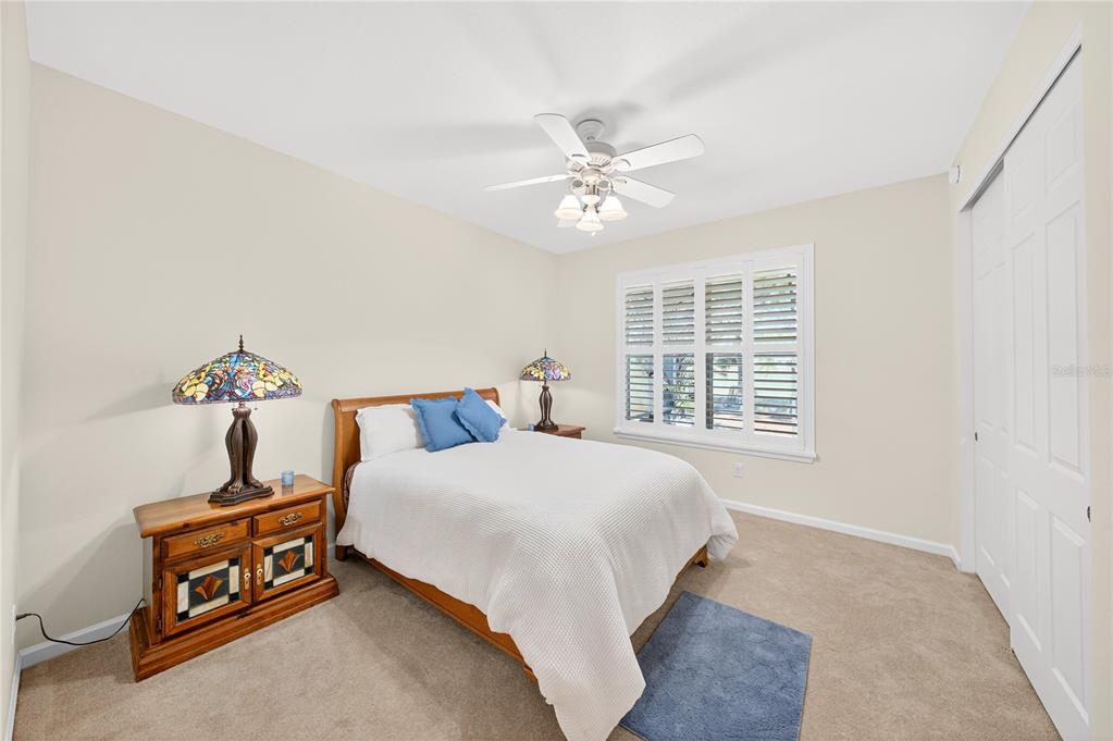 7527 Southwest 97th Terrace Road Ocala, FL 34481 - Photo 56 of 85 a bedroom with a bed and a window