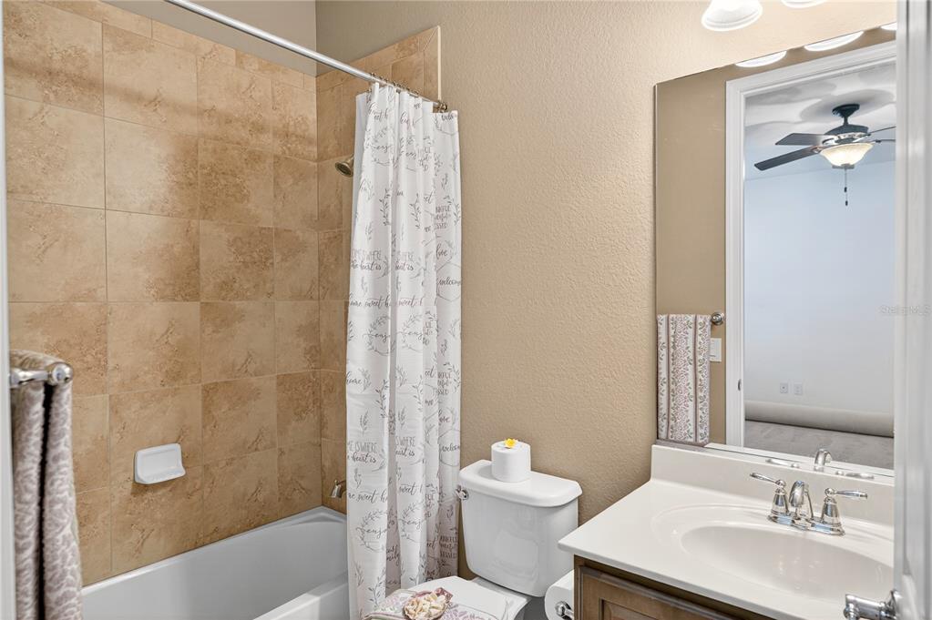 7527 Southwest 97th Terrace Road Ocala, FL 34481 - Photo 60 of 85 a bathroom with a sink toilet and shower