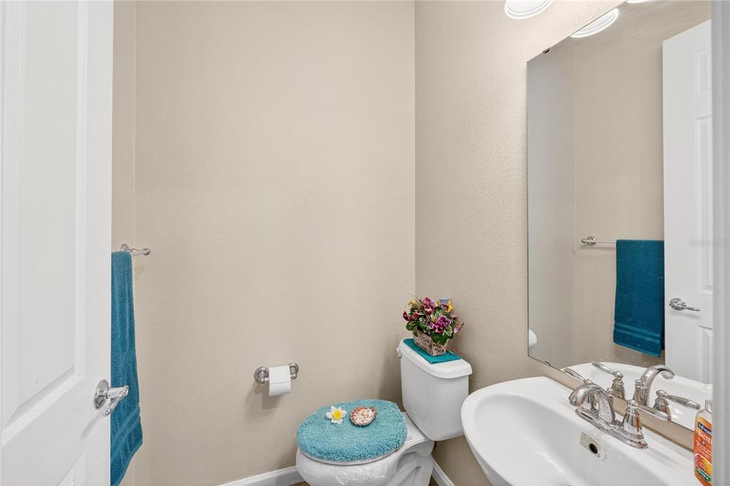 7527 Southwest 97th Terrace Road Ocala, FL 34481 - Photo 62 of 85 a bathroom with a sink and a mirror