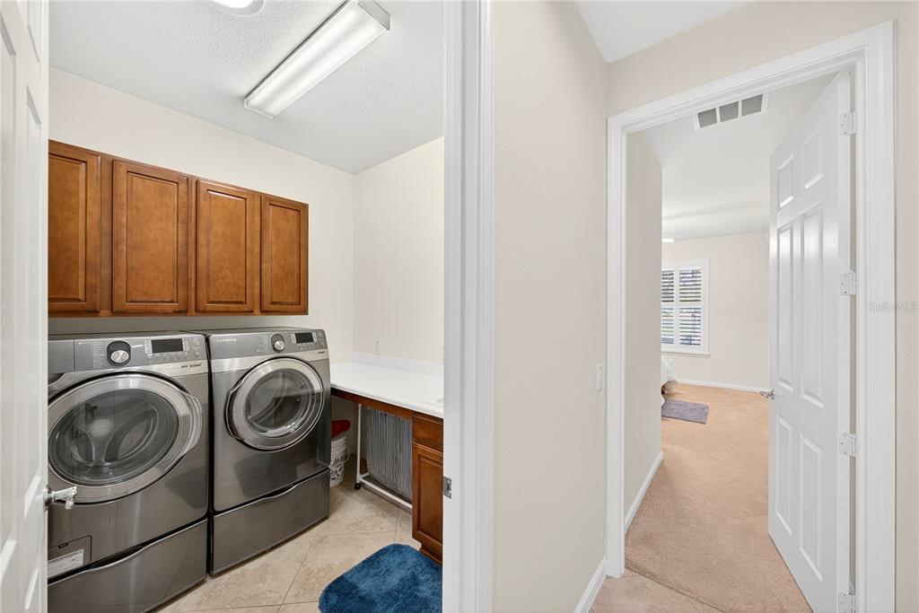 7527 Southwest 97th Terrace Road Ocala, FL 34481 - Photo 77 of 85 a utility room with dryer and washer
