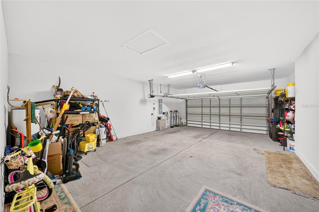 7527 Southwest 97th Terrace Road Ocala, FL 34481 - Photo 79 of 85 a view of a garage with rack and bicycle