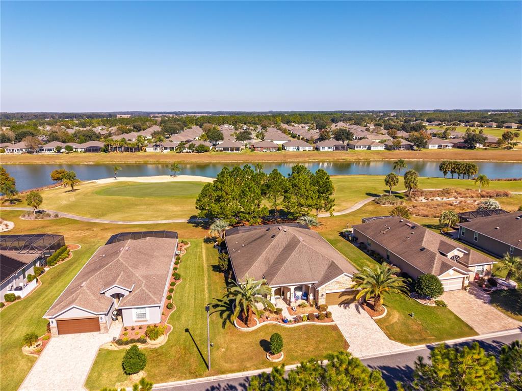 7527 Southwest 97th Terrace Road Ocala, FL 34481 - Photo 84 of 85 an aerial view of residential houses with outdoor space