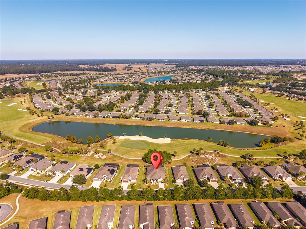 7527 Southwest 97th Terrace Road Ocala, FL 34481 - Photo 10 of 85 an aerial view of residential building and ocean view
