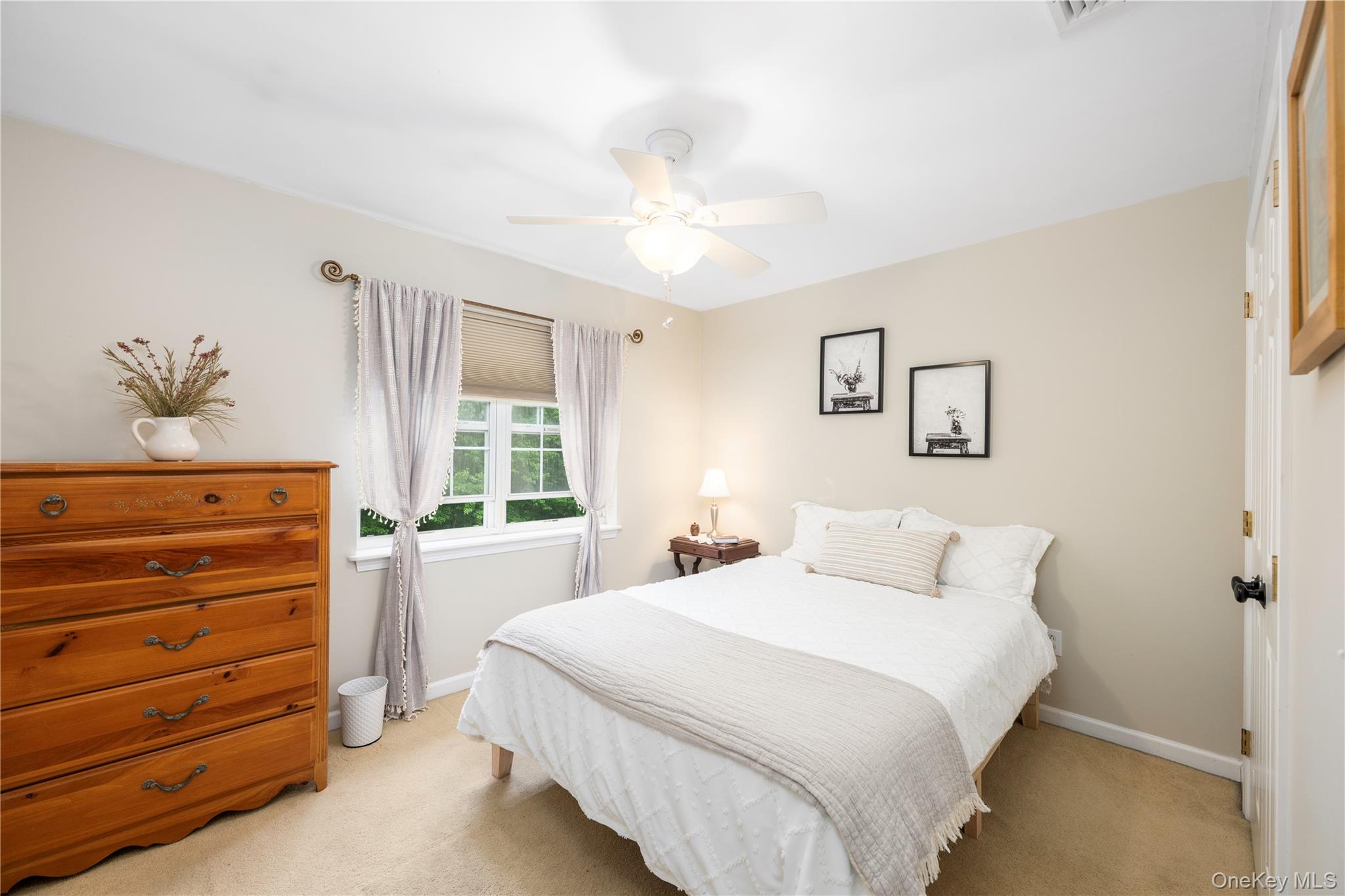 129 Stringham Road, Unit 31 LaGrangeville, NY 12540 - Photo 14 of 26 a bedroom with a bed and a window