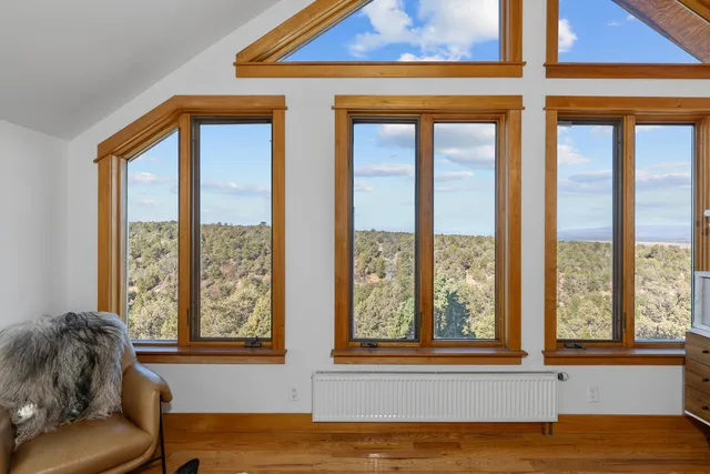 view of living room with wooden floor and cabinet