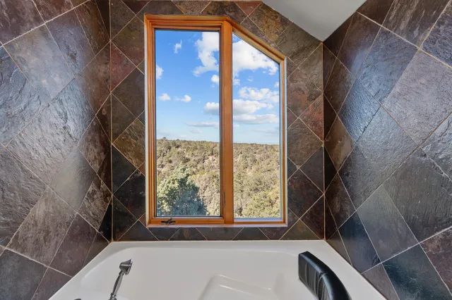 a view of a glass door with a view of the windows