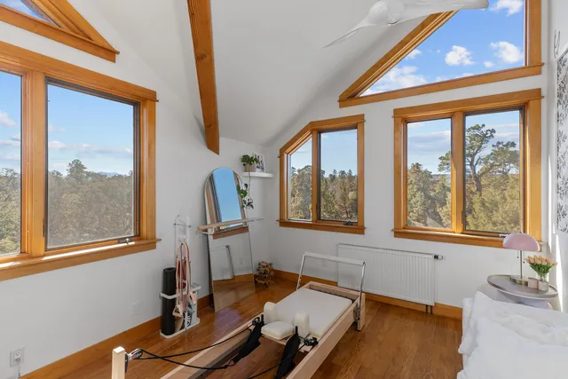a view of a living room with a large window