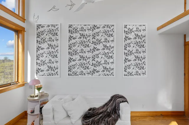 a view of balcony with furniture