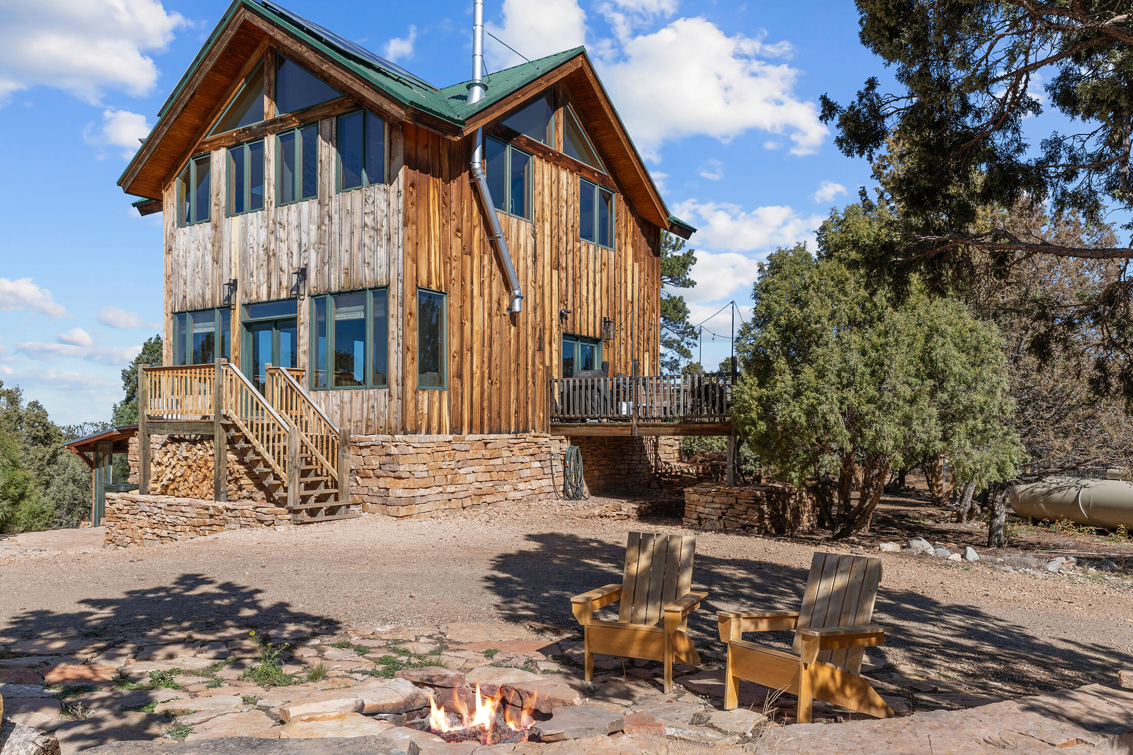 2699 County Road Norwood, CO 81423 - Photo 39 of 64 a view of a house with a yard