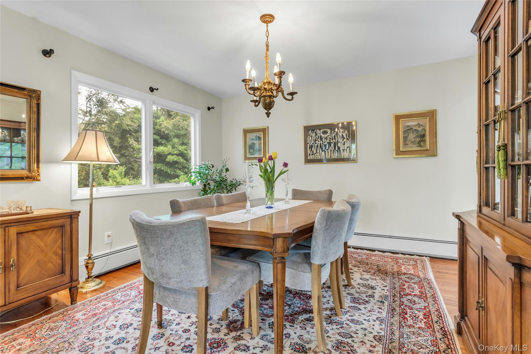 28 Penguin Lane Commack, NY 11725 - Photo 11 of 38 a view of a dining room with furniture window and outside view