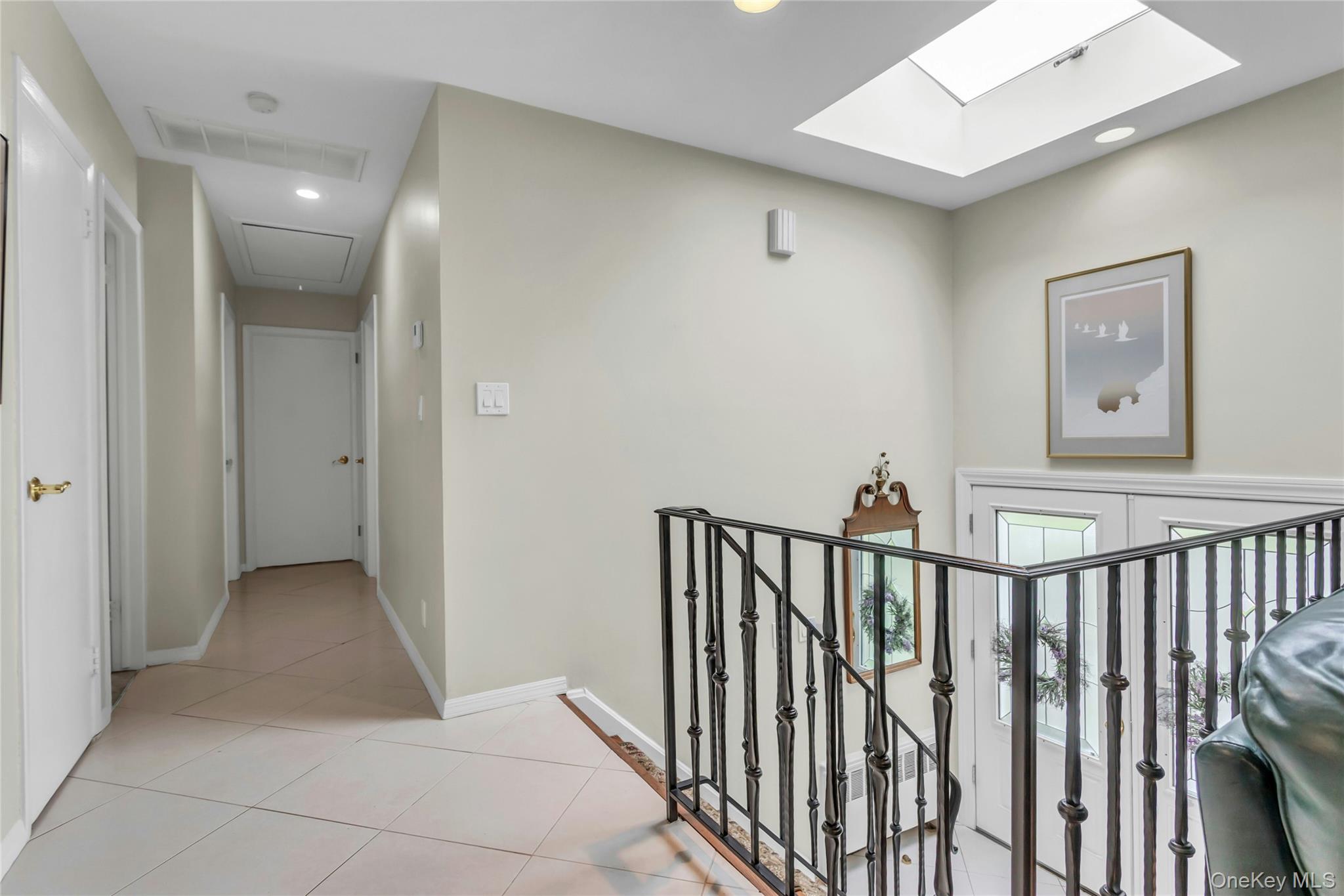 28 Penguin Lane Commack, NY 11725 - Photo 6 of 38 a view of a hallway with a elevator