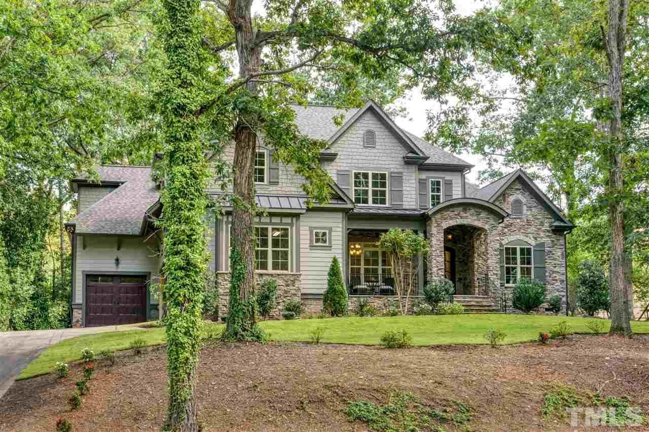 1216 Hunting Ridge Road Raleigh, NC 27615 - Photo 28 of 30 a front view of a house with a yard