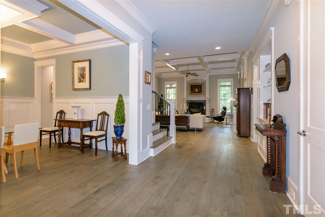 1216 Hunting Ridge Road Raleigh, NC 27615 - Photo 6 of 30 a living room with furniture and a wooden floor