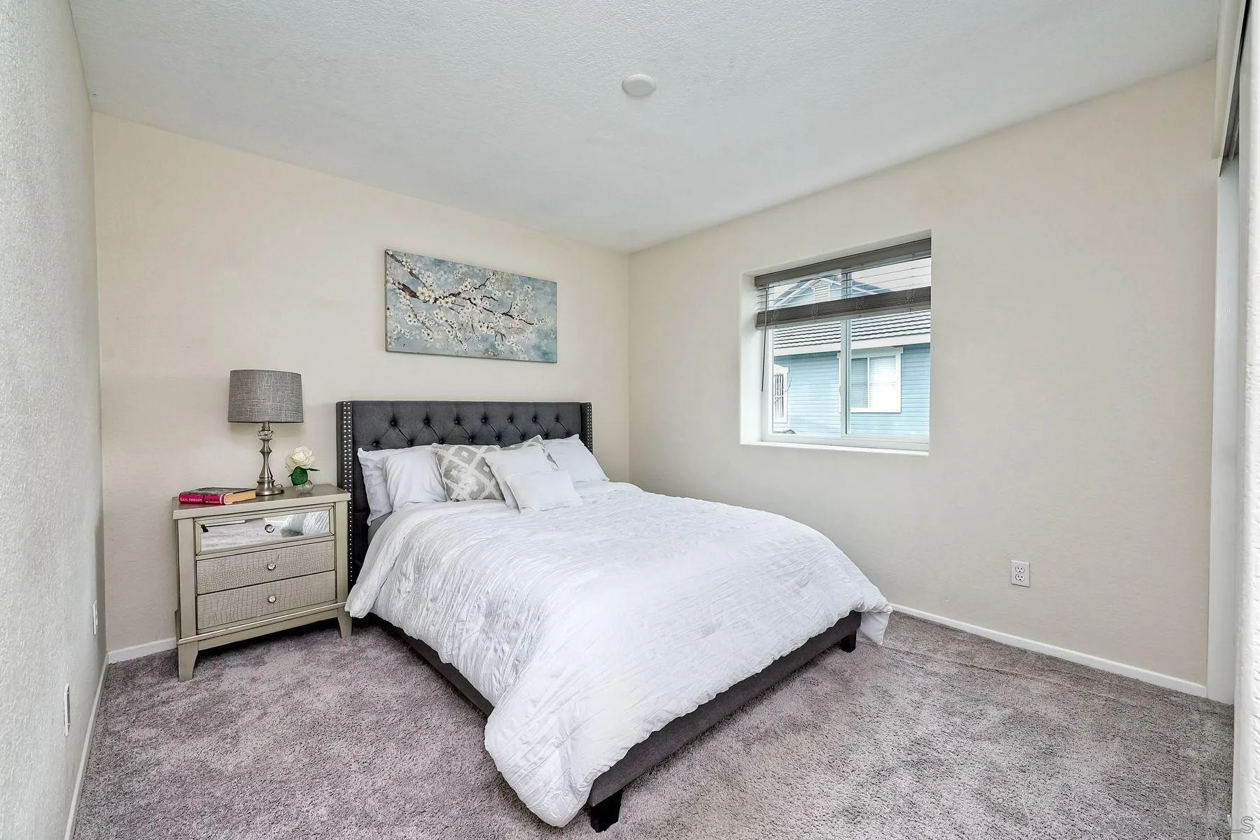13933 Midland Road Poway, CA 92064 - Photo 25 of 42 a bedroom with a bed and a window