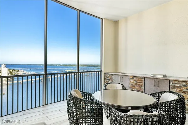 a view of balcony with furniture
