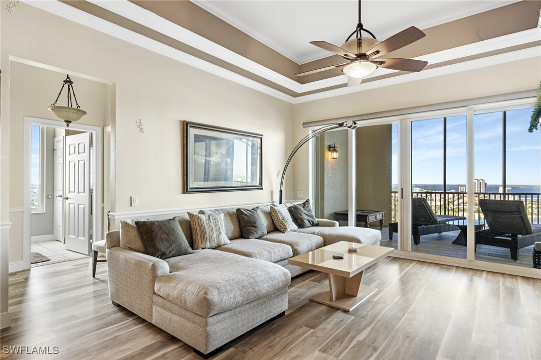 2745 First Street, Unit 2703 Fort Myers, FL 33916 - Photo 21 of 34 a living room with furniture and a large window