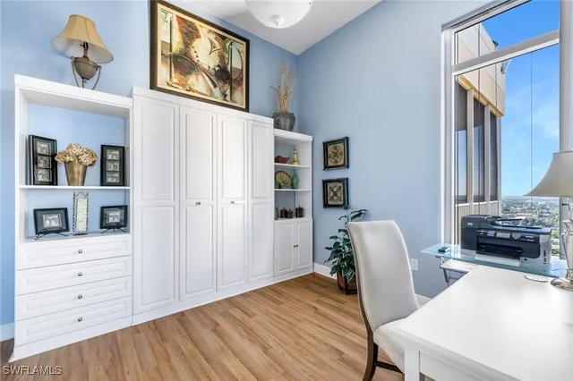 a view of a swimming pool with a lounge chairs