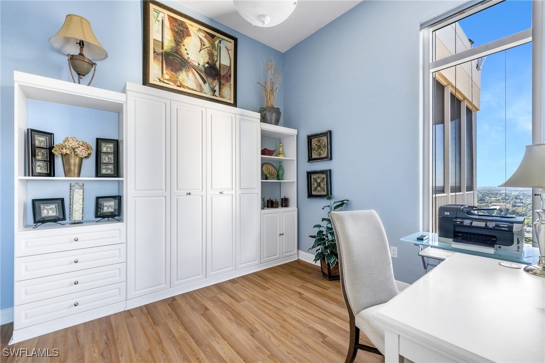 2745 First Street, Unit 2703 Fort Myers, FL 33916 - Photo 29 of 34 a view of a livingroom with furniture and window