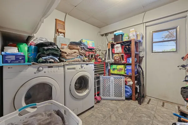 a view of a storage & utility room with toys