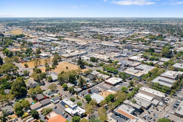 an aerial view of a city with lots of residential buildings
