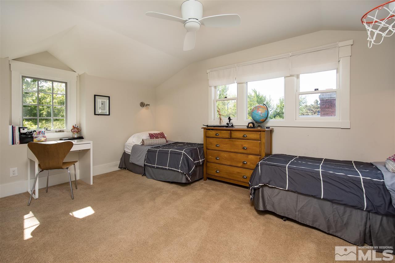 613 Gordon Avenue Reno, NV 89509 - Photo 12 of 16 a bedroom with a bed and window