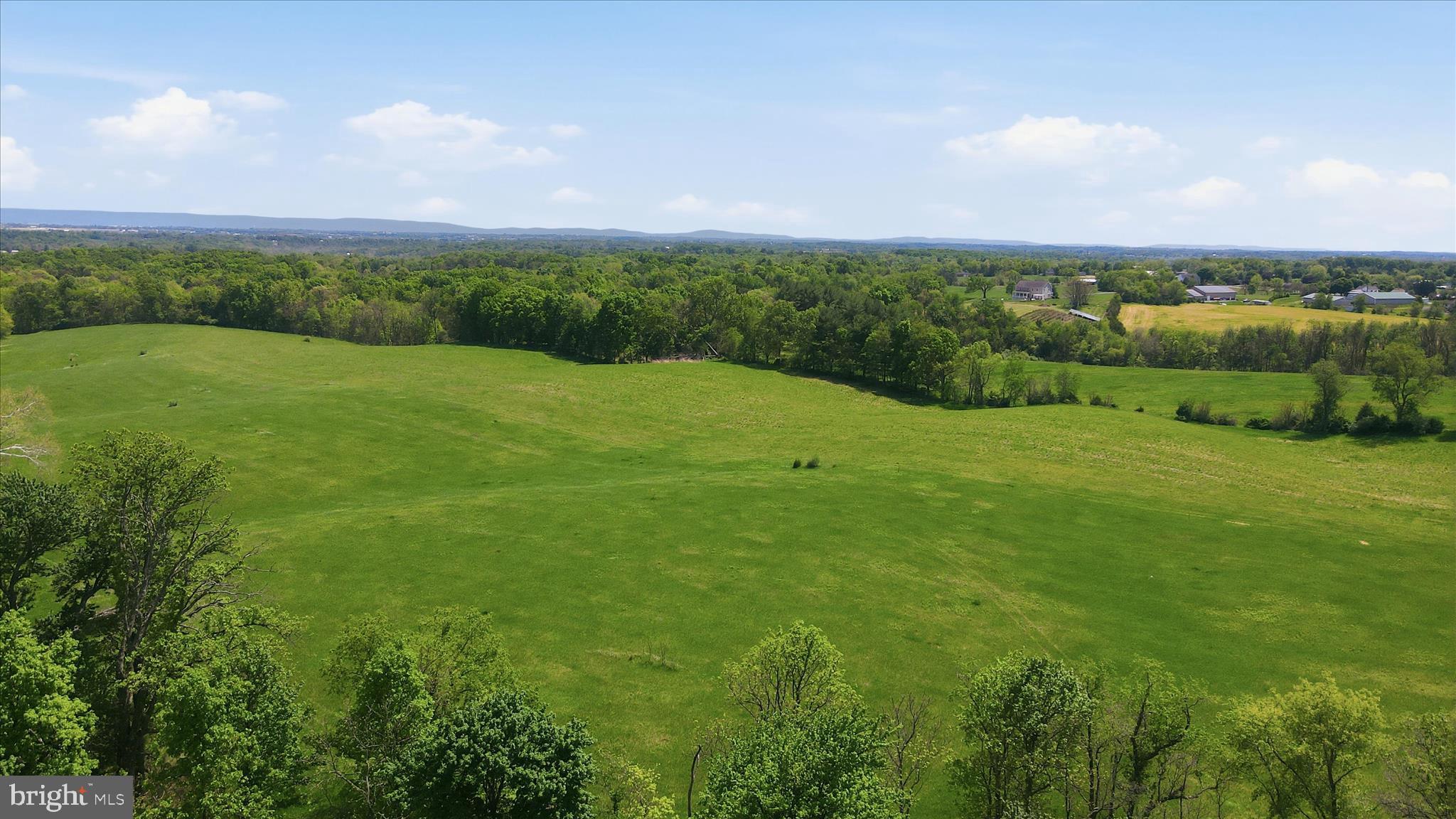 6512 Bino Road, Unit LOT 4 Greencastle, PA 17225 - Photo 8 of 10 a view of a field with an trees in the background