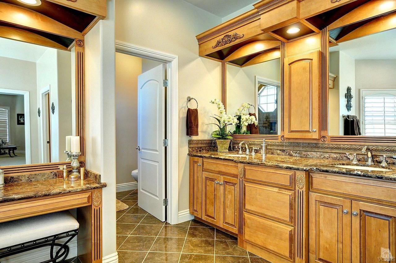 2371 Duval Road Camarillo, CA 93012 - Photo 22 of 50 a bathroom with a sink and a mirror