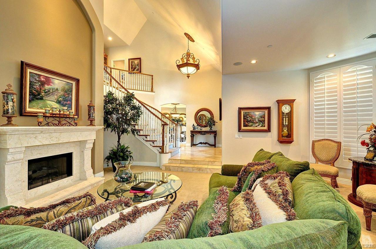 2371 Duval Road Camarillo, CA 93012 - Photo 5 of 50 a living room with furniture a fireplace and a flat screen tv