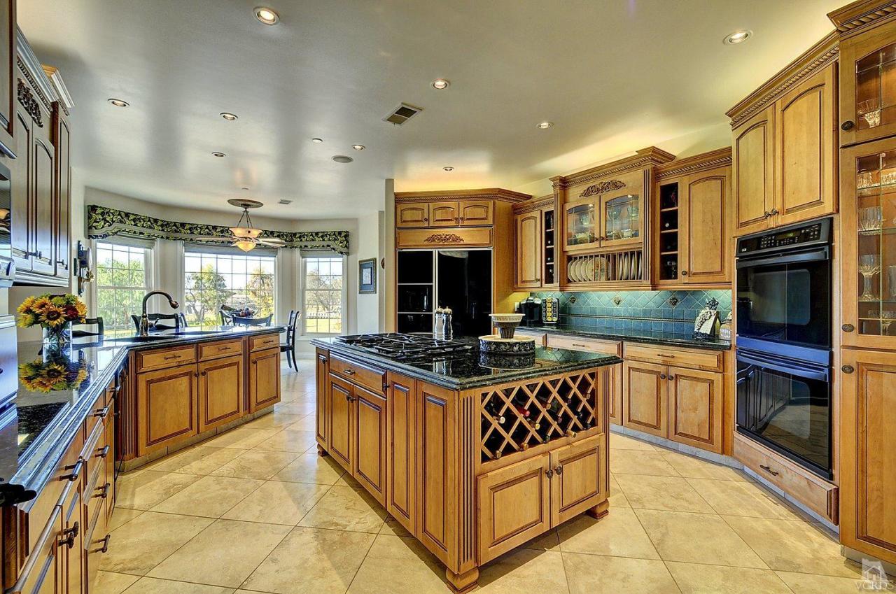 2371 Duval Road Camarillo, CA 93012 - Photo 7 of 50 a kitchen with stainless steel appliances granite countertop a stove and a sink
