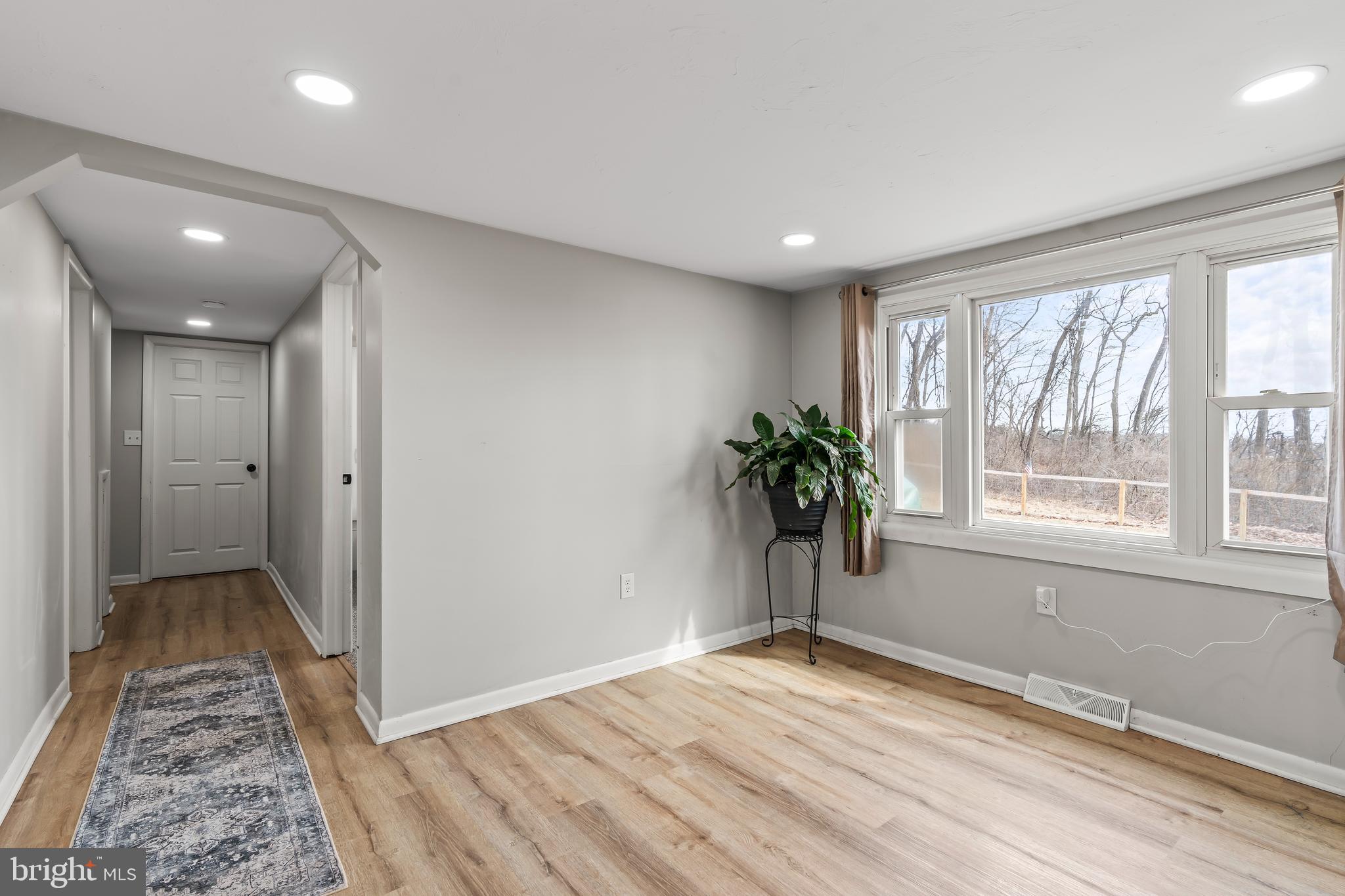 5150 Nursery Road Dover, PA 17315 - Photo 11 of 38 a view of empty room with wooden floor and fan
