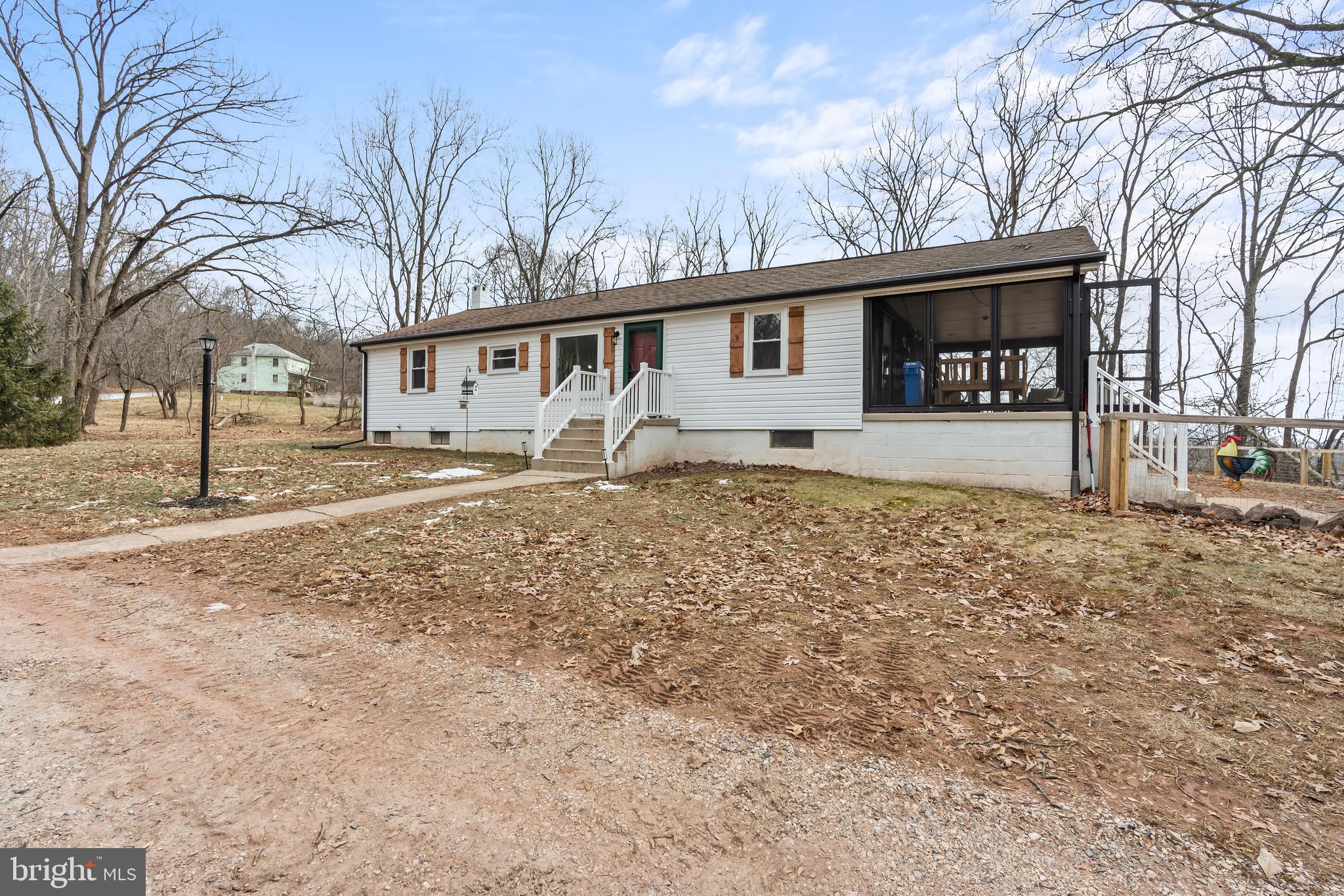 5150 Nursery Road Dover, PA 17315 - Photo 26 of 38 a house that has a tree in front of it