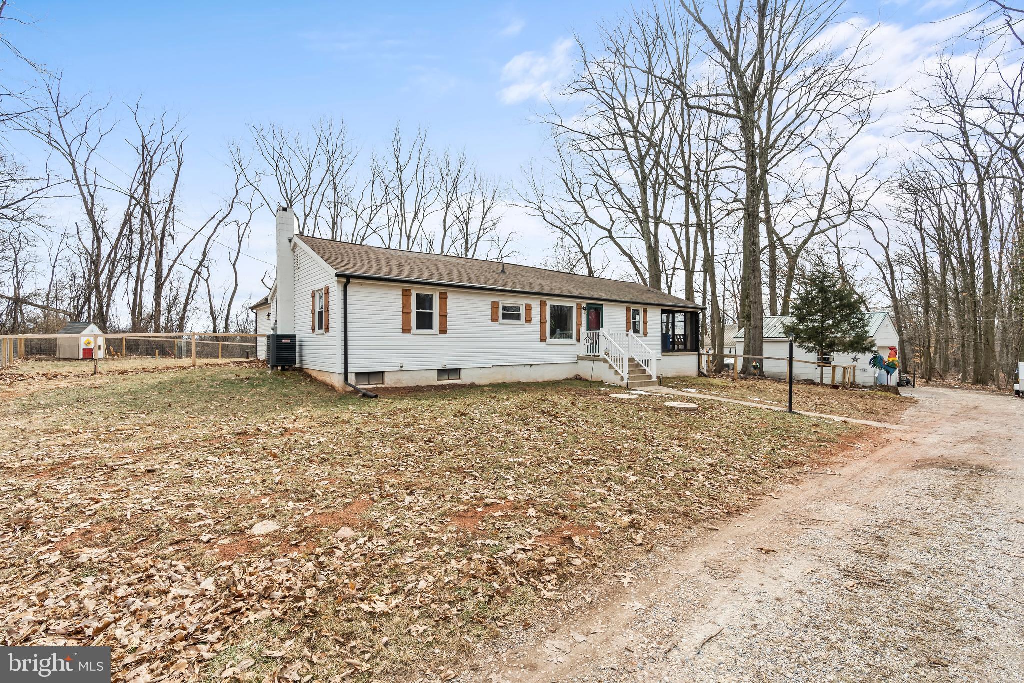 5150 Nursery Road Dover, PA 17315 - Photo 27 of 38 a view of a house with a yard covered in snow