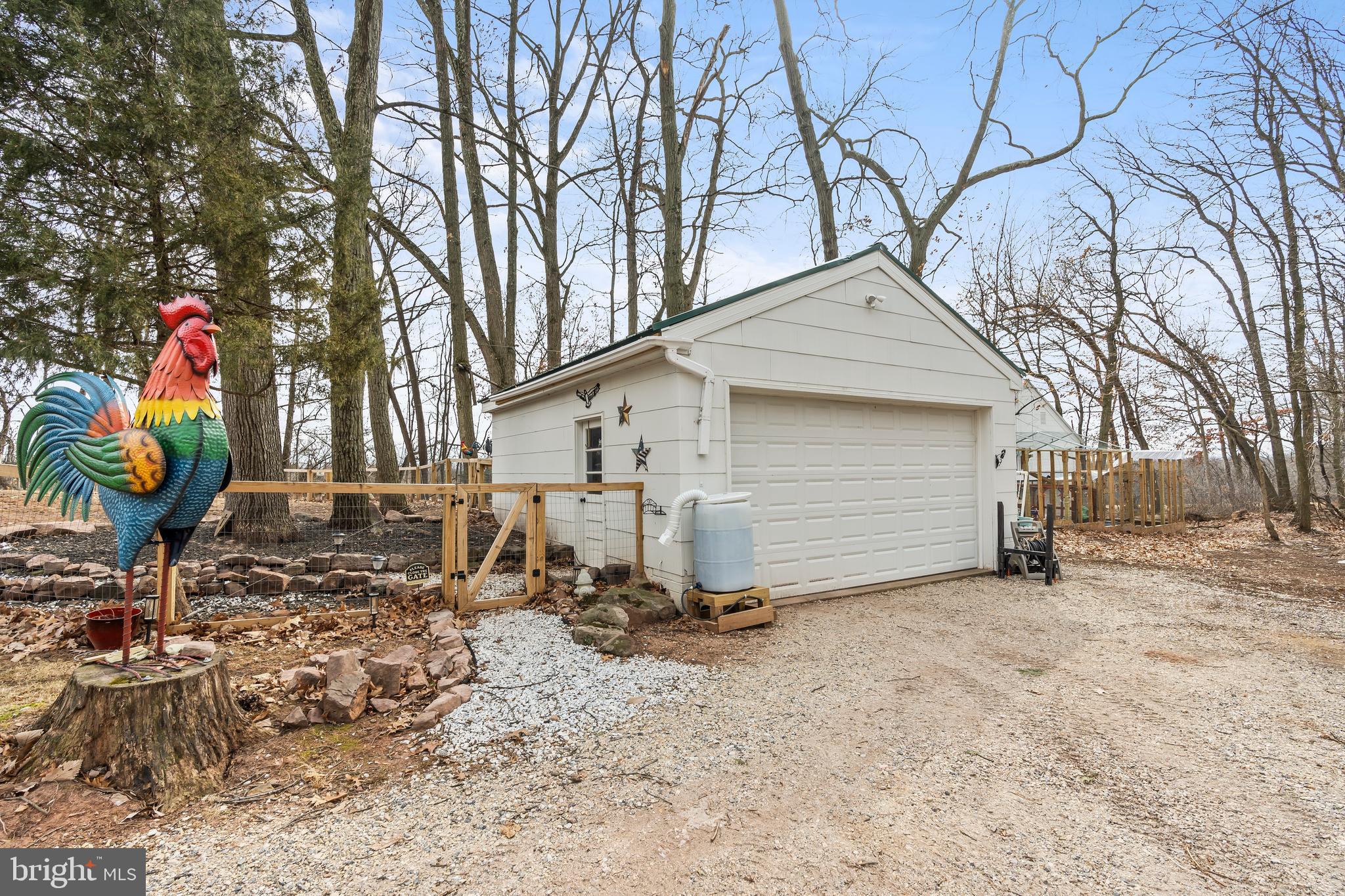 5150 Nursery Road Dover, PA 17315 - Photo 28 of 38 a front view of a house with garden