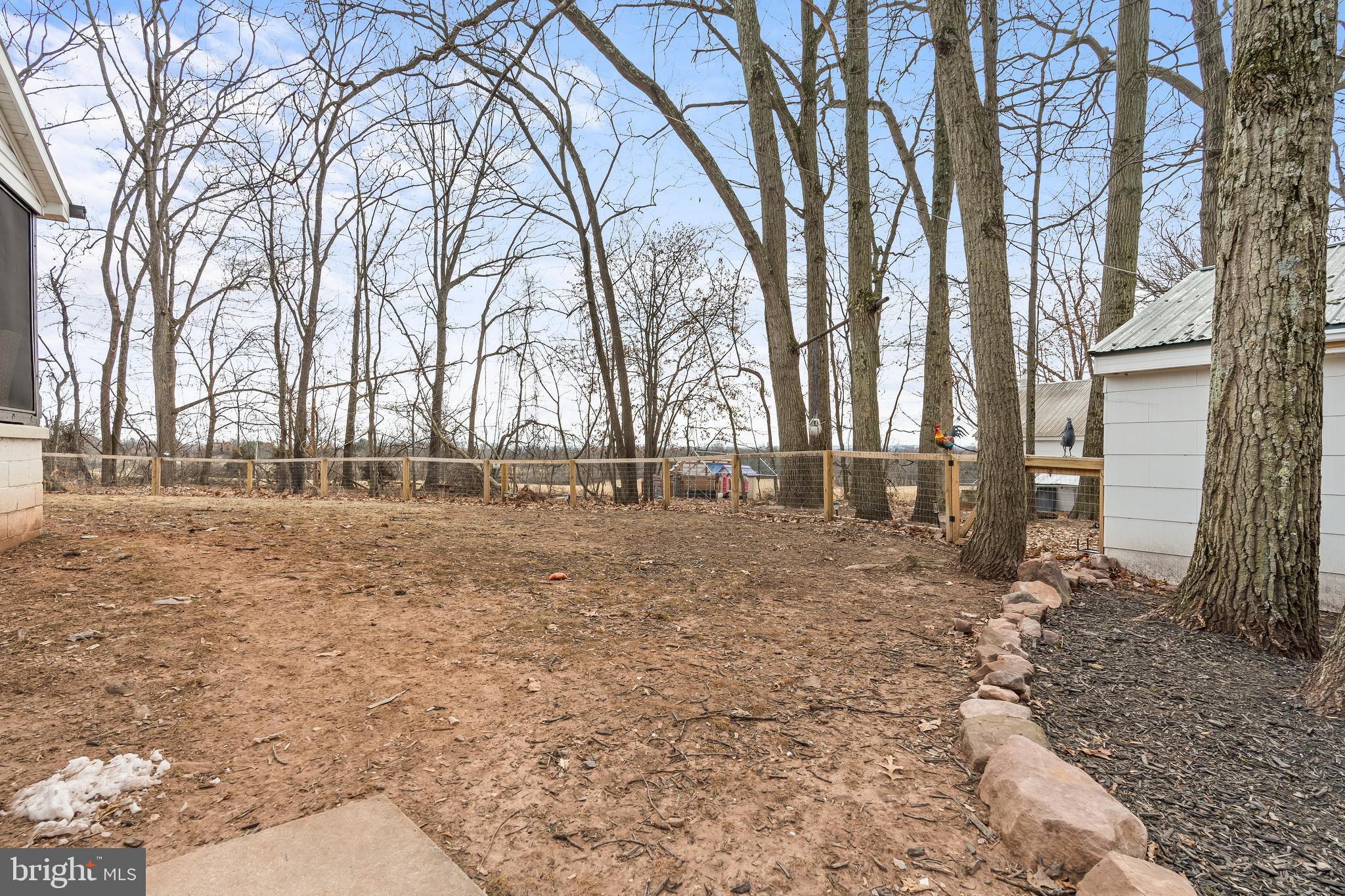 5150 Nursery Road Dover, PA 17315 - Photo 32 of 38 a backyard of a house with lots of green space