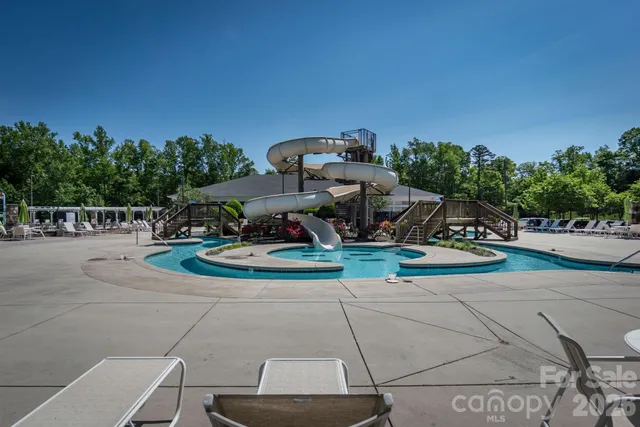 a view of a park with large trees