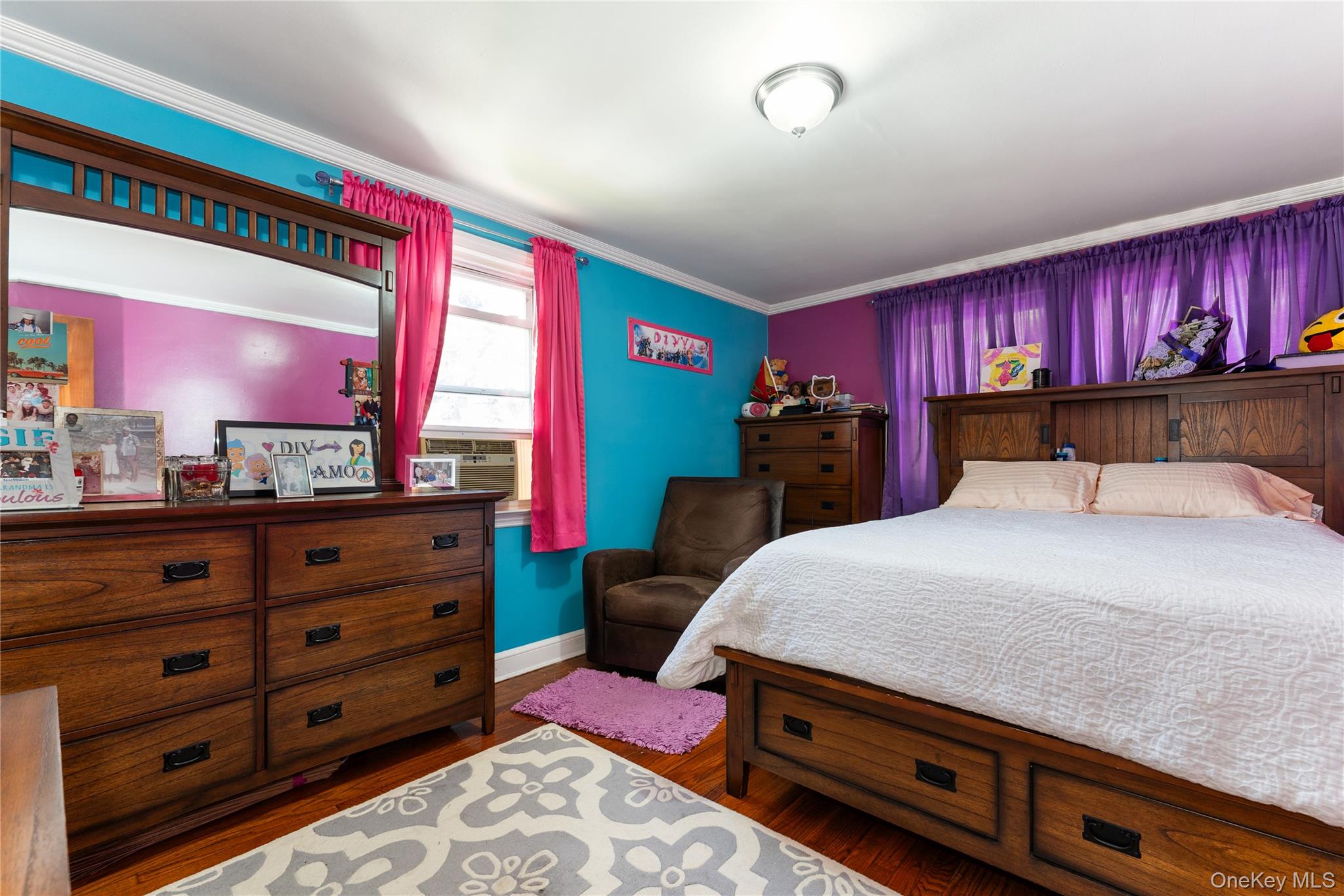 7 Mayfair Road Baldwin, NY 11510 - Photo 14 of 27 a bed room with a bed and a window