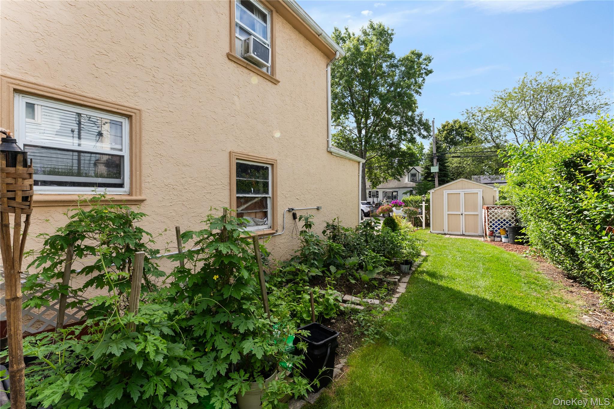 7 Mayfair Road Baldwin, NY 11510 - Photo 19 of 27 a front view of a house with garden