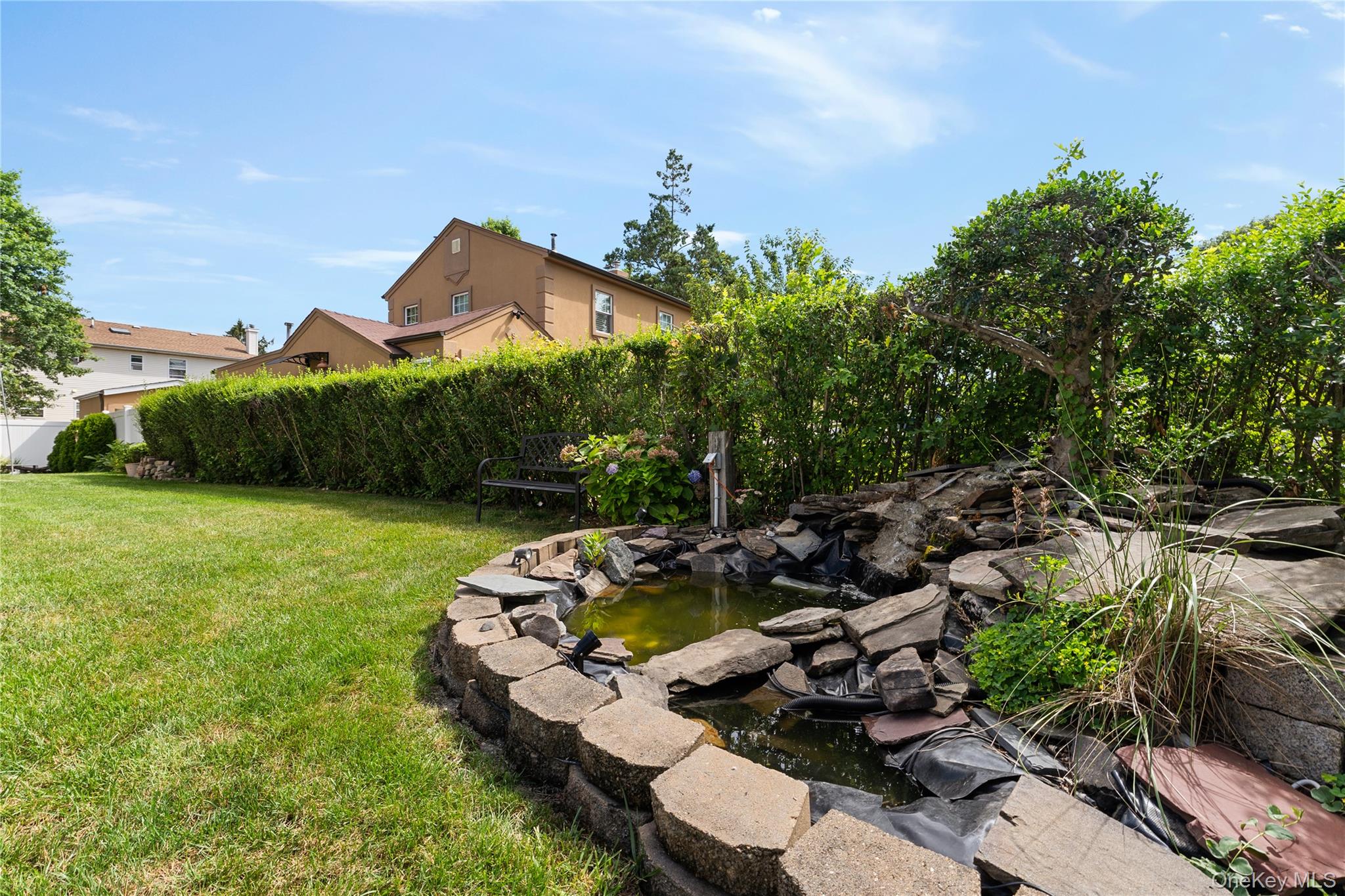 7 Mayfair Road Baldwin, NY 11510 - Photo 21 of 27 a aerial view of a house with swimming pool garden and patio