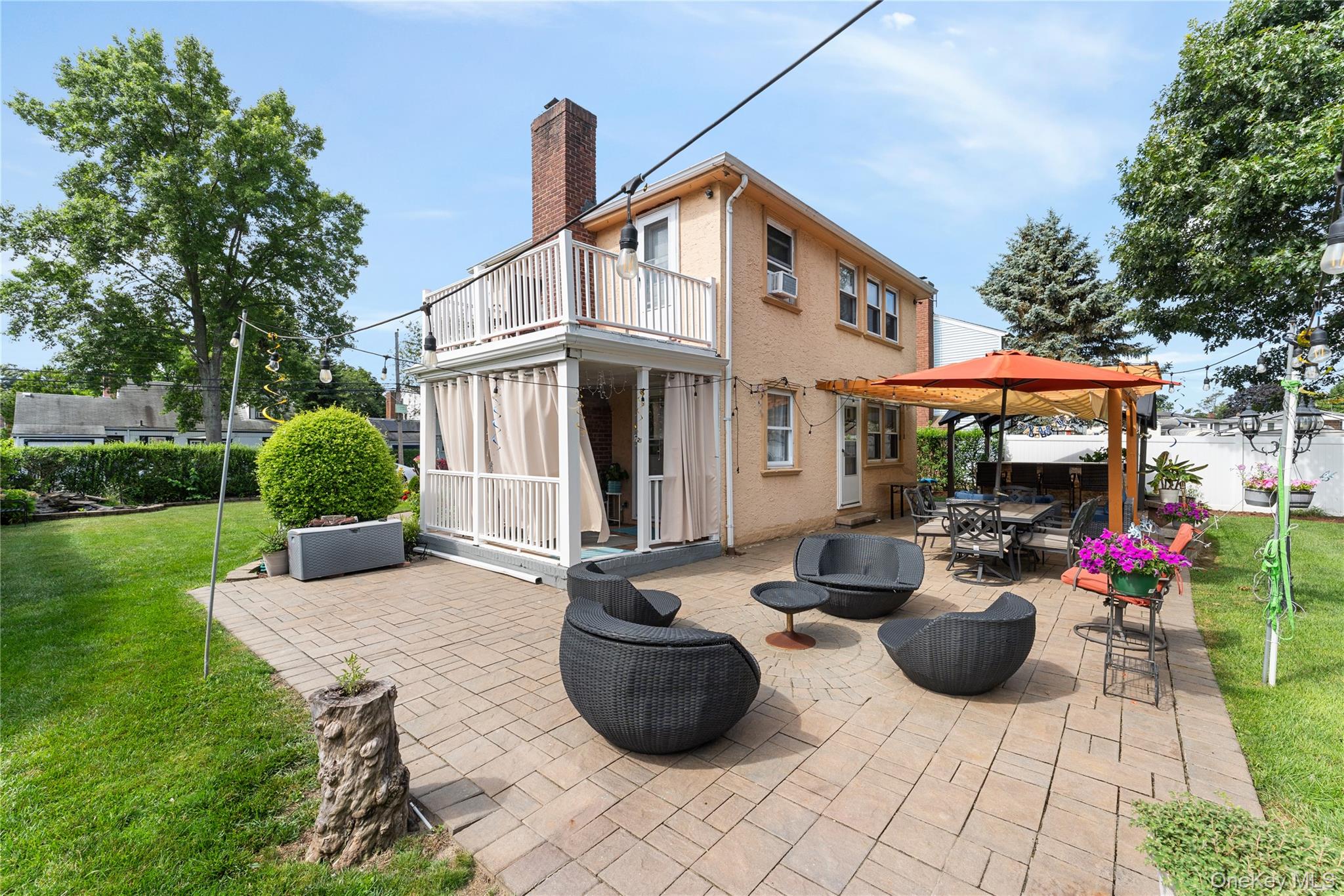 7 Mayfair Road Baldwin, NY 11510 - Photo 22 of 27 a view of a patio with chairs and plants
