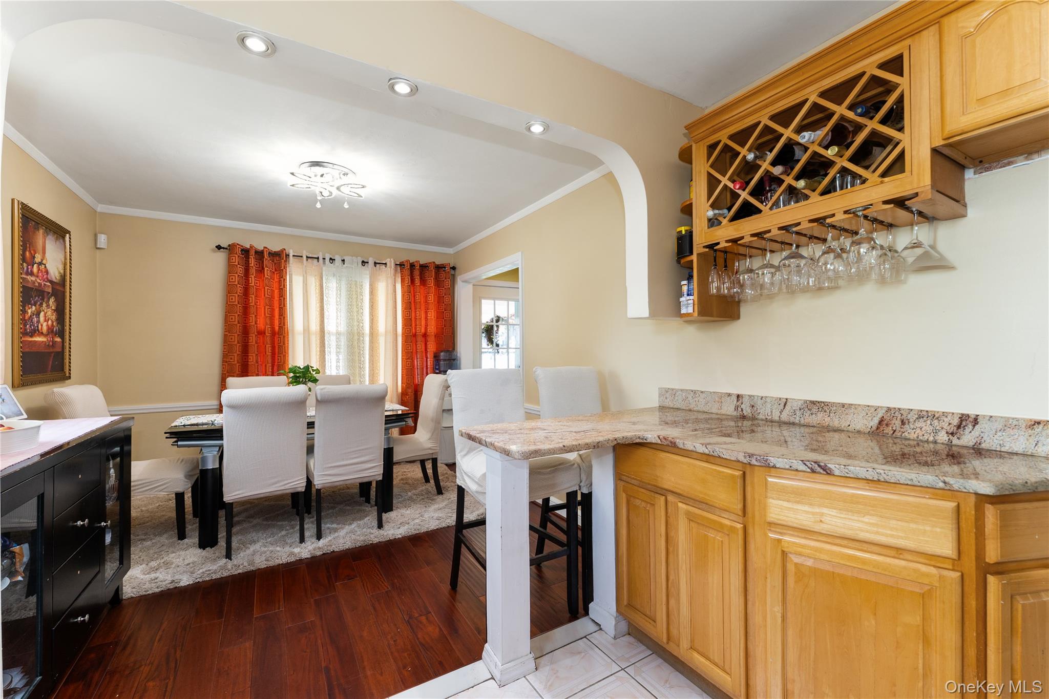 7 Mayfair Road Baldwin, NY 11510 - Photo 10 of 27 a view of a kitchen area with furniture and wooden floor