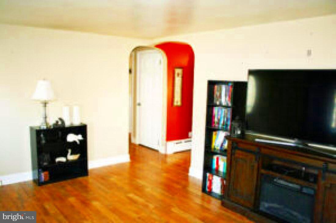 828 Weavertown Road Lebanon, PA 17046 - Photo 16 of 38 a living room with furniture and flat screen tv